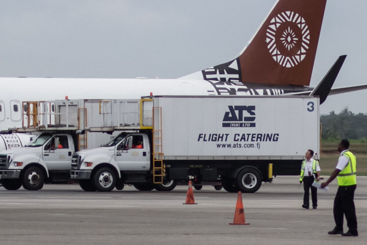 Air cargo containers prepared for loading at a freight facility